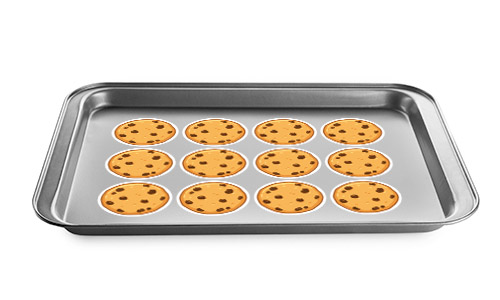 Baking sheet with chocolate chip decal cookies on it.