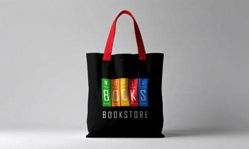 Black tote bag branded with World of Books Bookstore logo