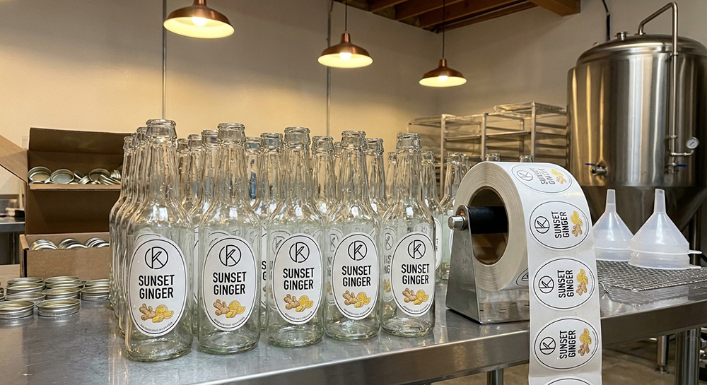 Custom white oval roll labels for bottled drinks | Decals.com